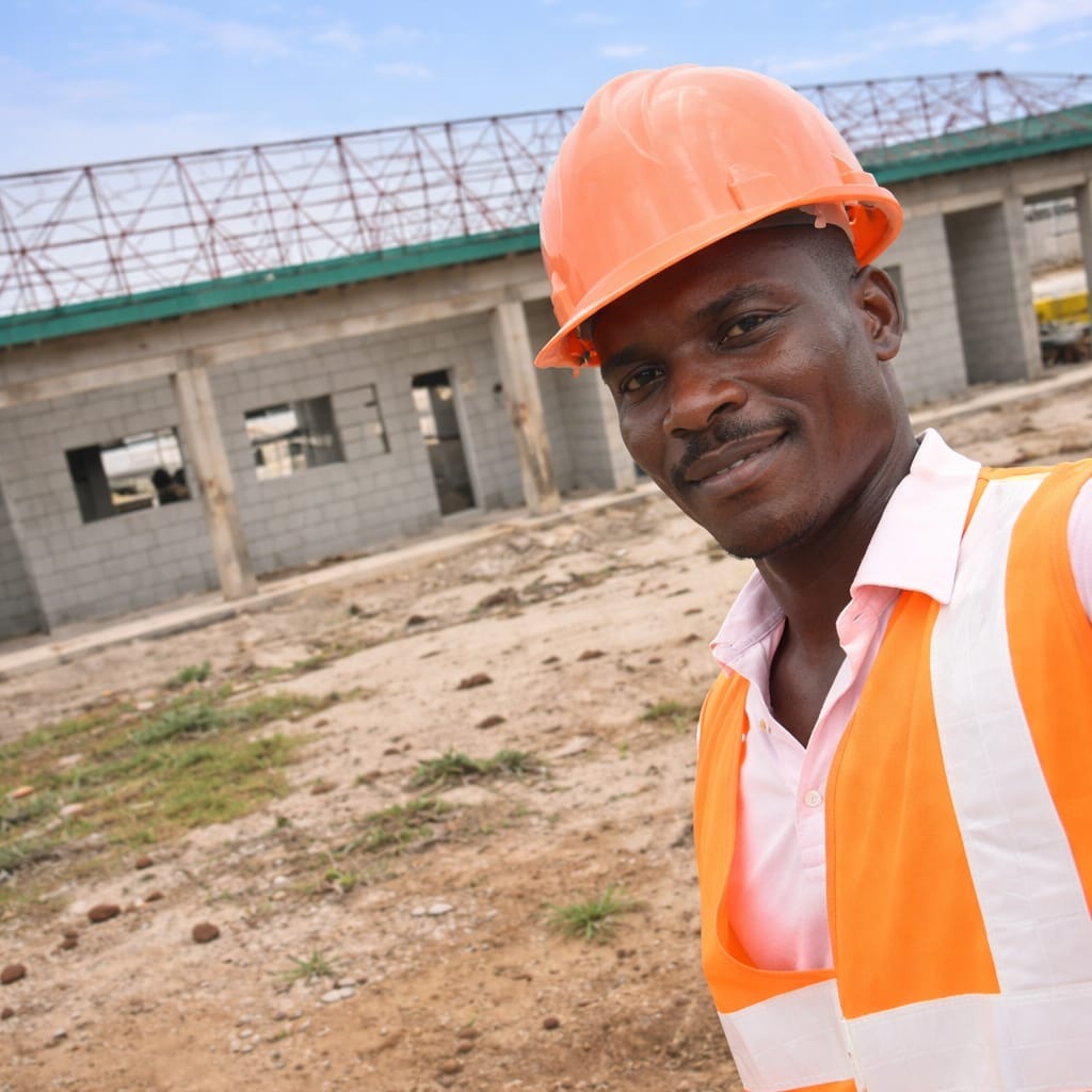 Gabike roofer in safety gear on an active project site