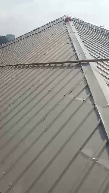 Roofing crew at work on site