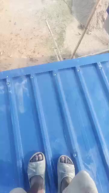 Close look at roof sheet fixing